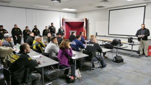 Law Enforcement personnel meet for briefing at the West Sacramento Police Department prior to the operation.