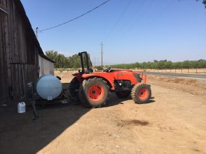 Image depicts tractor with illegal pesticides