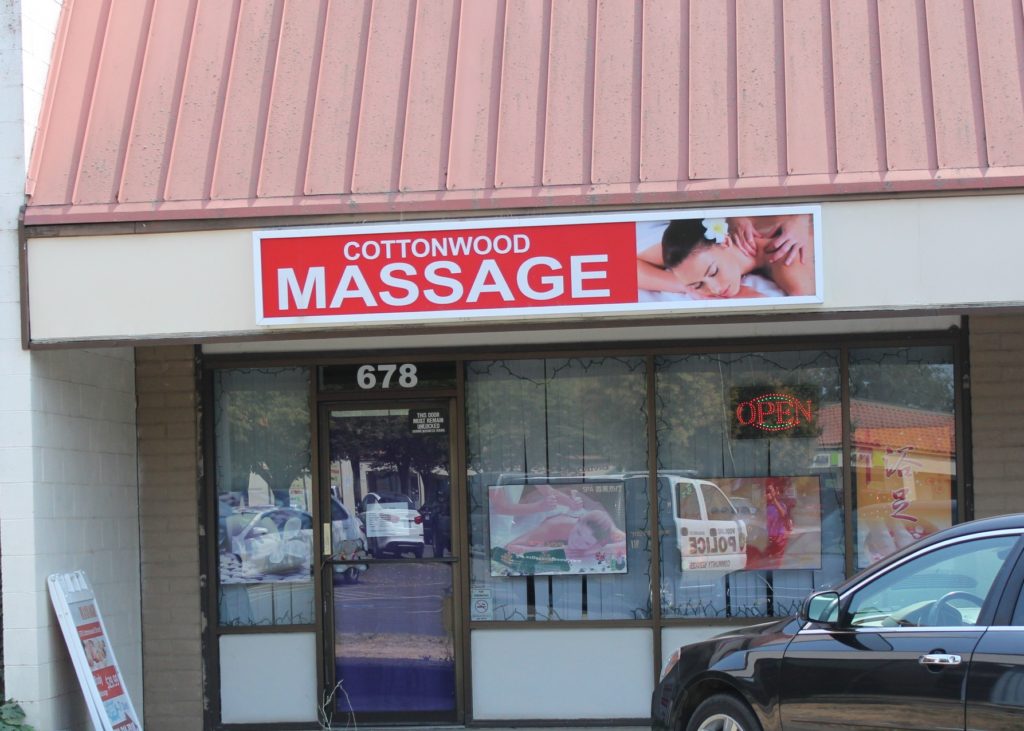 Image depicts the storefront of the massage parlor where the victim was murdered.
