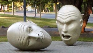 Image depicts the Yin and Yang egghead sculpture prior to vandalism.