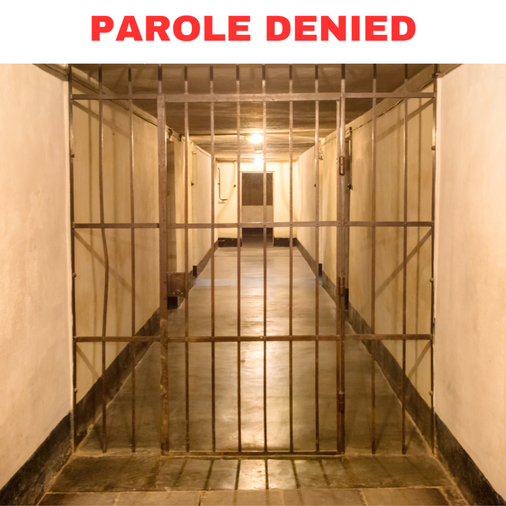 Image depicts a jail cell and the words: Parole Denied